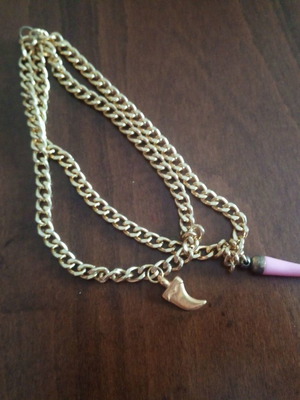 Double chain with tooth charms used, metal and acrylic
