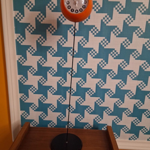 Quartz space age table clock 1970s, orange with black base