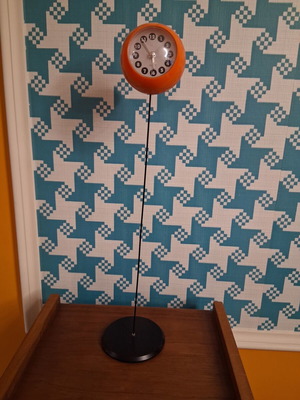 Quartz space age table clock 1970s, orange with black base