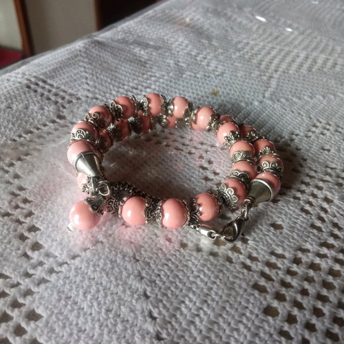 Handmade pink bracelet with beads and silver tones new