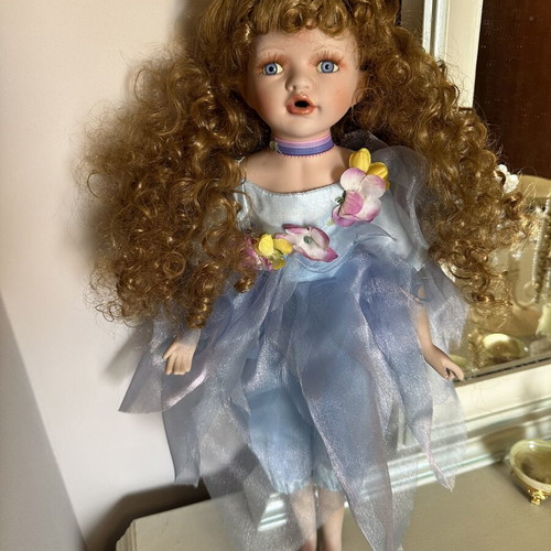 Porcelain doll fairy like new