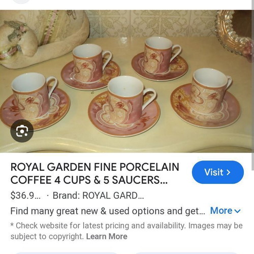 Porcelain cup set new with 6 saucers in pink and orange shades