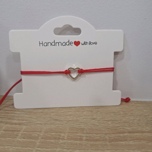 Handmade macrame bracelet with steel heart in gold and silver colors