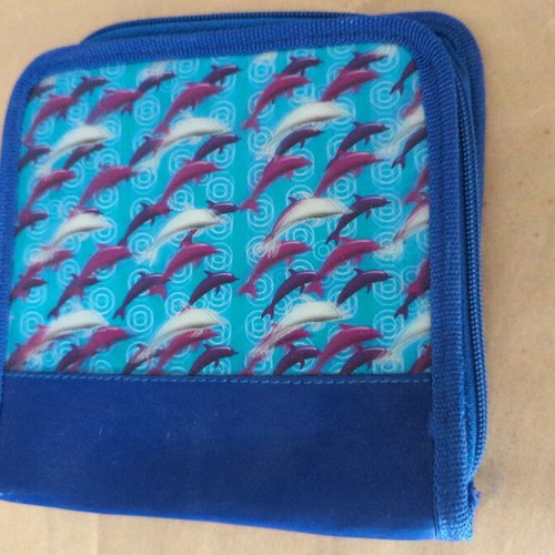 CD case used, blue with 3D dolphins