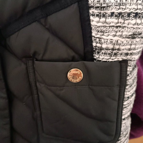 Juicy Couture jacket with down lining size Medium like new, black and white