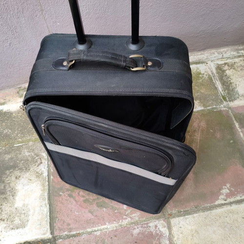 Wheeled suitcase used black