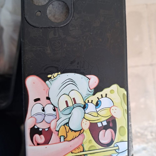iPhone 13 case with SpongeBob design used plus free purple MagSafe case