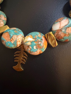 Handmade bracelet with round semi-precious stones, gold hematite and steel elements new, turquoise and gold
