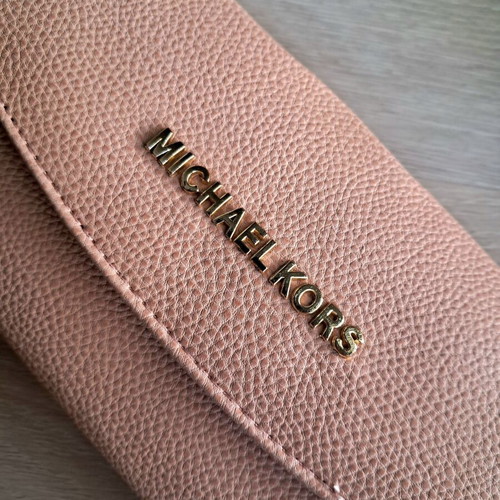 Michael Kors pink leather wallet like new with gold letters
