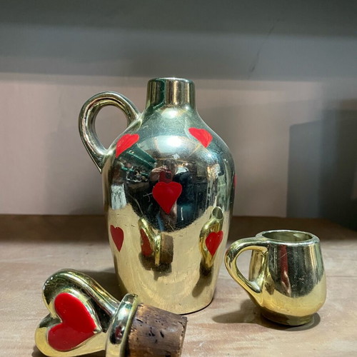 Pitcher and cup like new, shiny gold with hearts 1960