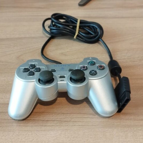 PS2 Silver Controller used for repair or parts