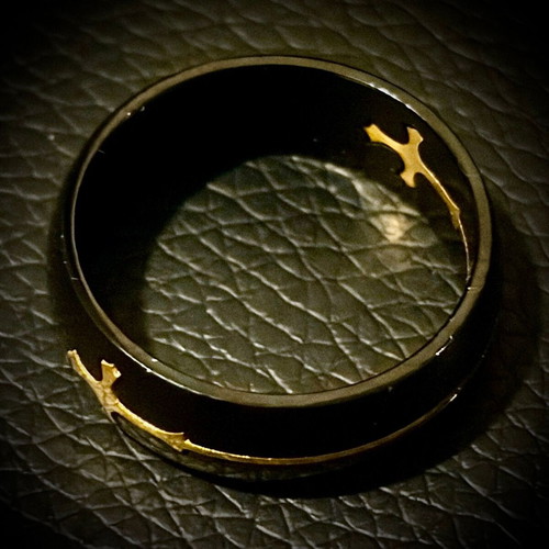 Black ring with removable gold crosses, M FORGE