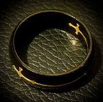 Black ring with removable gold crosses, M FORGE