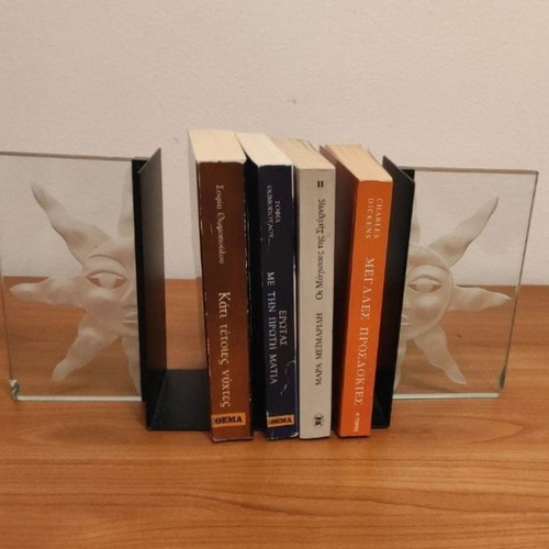 Bookends set like new, metal and glass with embossed design