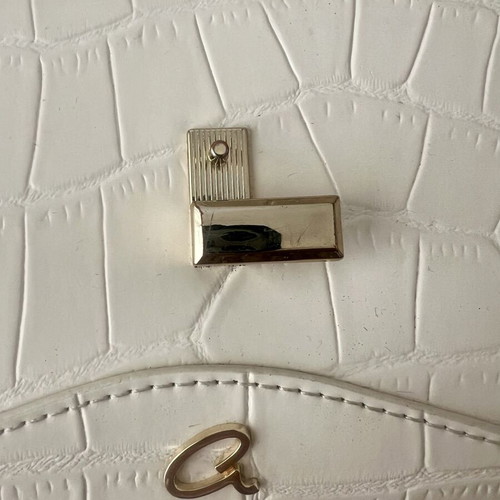 Axel shoulder bag in ivory with croco texture