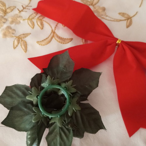 Christmas decorations used, ribbon damaged, small piece