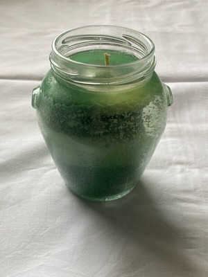 Handmade green candle in glass like new