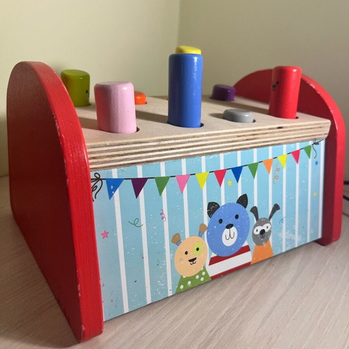 Wooden toy like new with sliding sticks