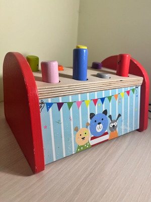 Wooden toy like new with sliding sticks