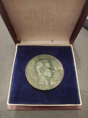 Olympic Games commemorative coin used in its case