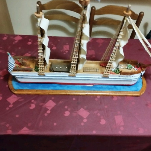 Handmade sailboat on base new with three masts