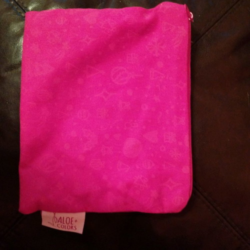 Aloe + Colors toiletry bag used, red Christmas design