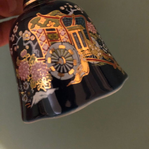 Porcelain bell with hand-painted design like new