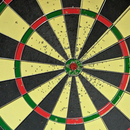Dartboard with darts used, double-sided
