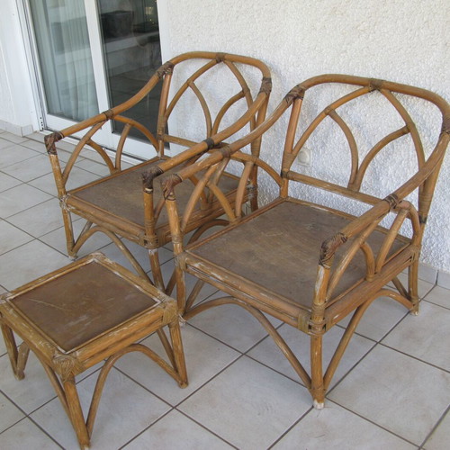 2 McGuire style rattan armchairs and 1 stool with cushions