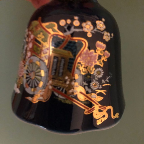 Porcelain bell with hand-painted design like new
