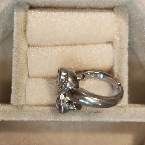 Silver ring with amethysts adjustable size, like new