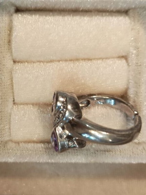 Silver ring with amethysts adjustable size, like new