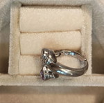 Silver ring with amethysts adjustable size, like new
