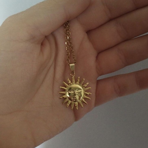 Handmade steel necklace with gold-plated sun pendant unisex new