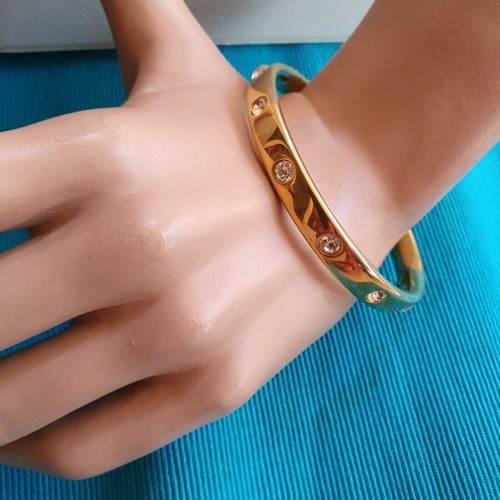 Vintage Monet bracelet like new, 22k gold plated with crystals