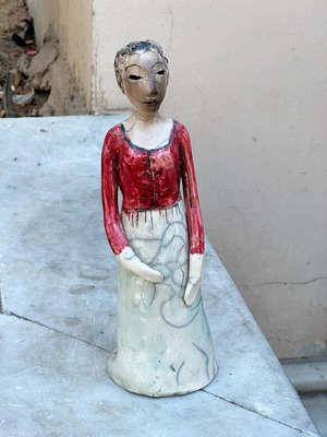 Handmade artistic ceramic woman statue used with rustic style