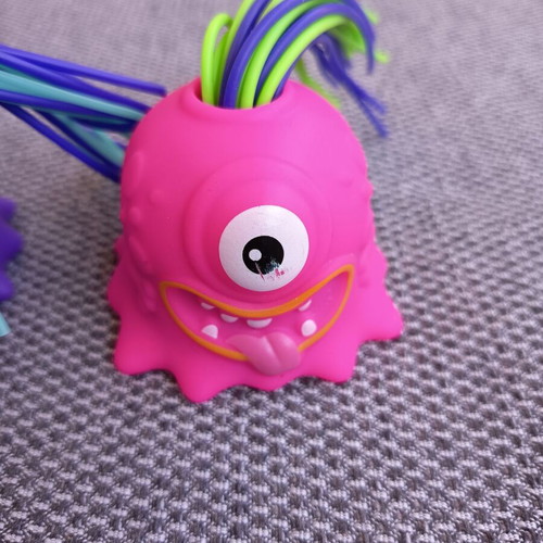 Apli Screaming Monsters figures used with elastic hair and funny sounds