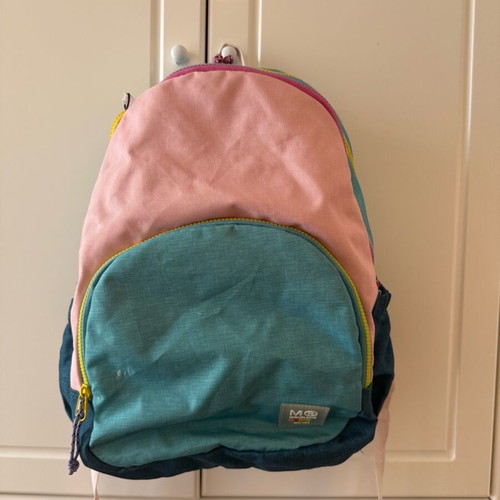 Children's school backpack used with multiple compartments and supportive back