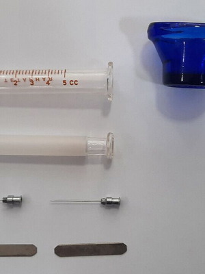 Vintage glass syringe 5 ml reusable with Optrex eye wash device used