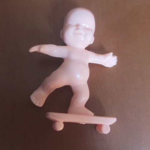 Collectible Mouroulini toy figure from the 1980s