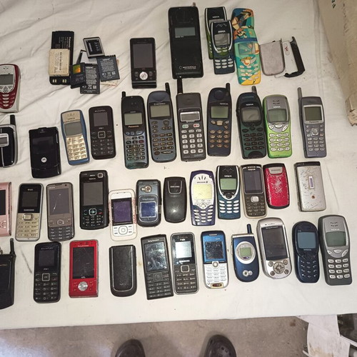 Vintage and retro mobile phones lot with chargers