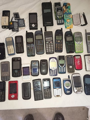 Vintage and retro mobile phones lot with chargers