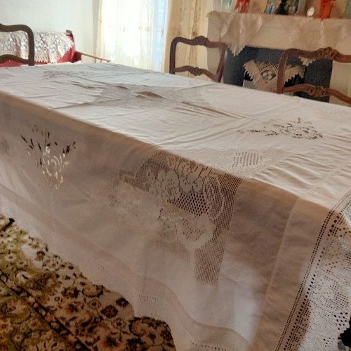 Handmade tablecloth used with knitted corners, lace and cutwork