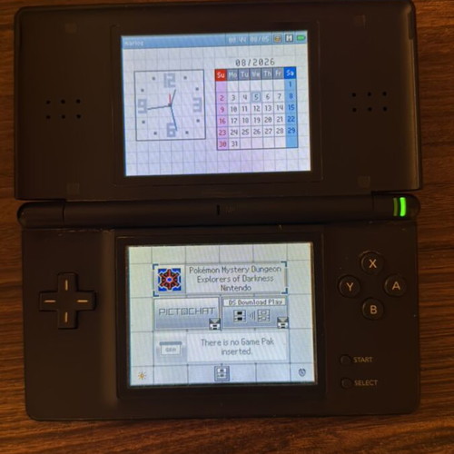 Nintendo DS Lite console like new with leather case and 2 Pokémon cartridges