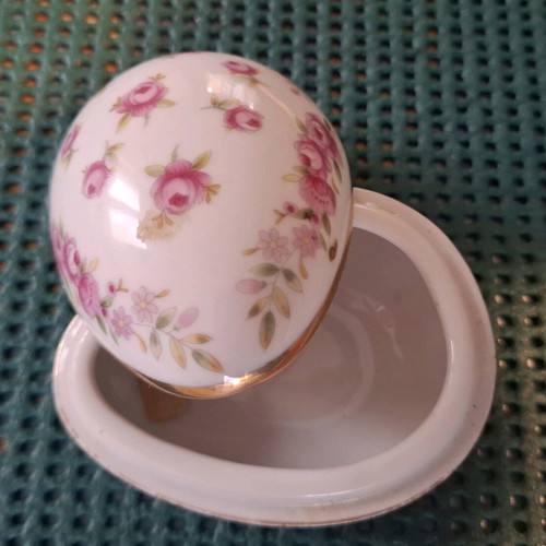 Porcelain decorative container used, small egg with pink flowers