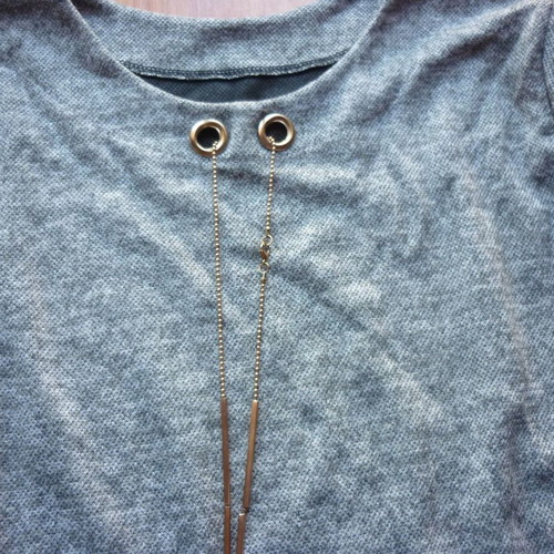 Women's blouse M/L gray like new, long back with hanging details