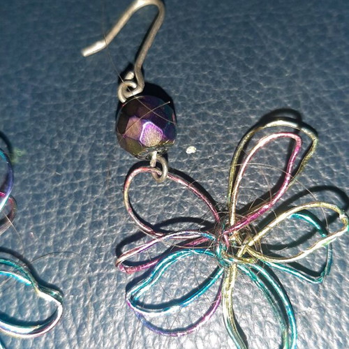 Handmade earrings used with colorful wire in pastel shades