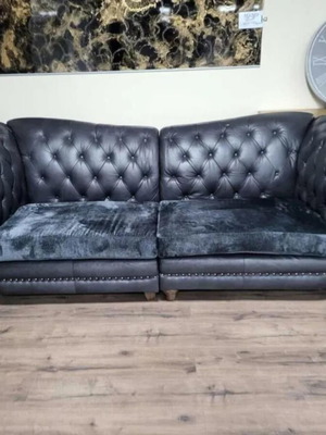 Two large dark gray Chesterfield sofas new, fabric and genuine leather