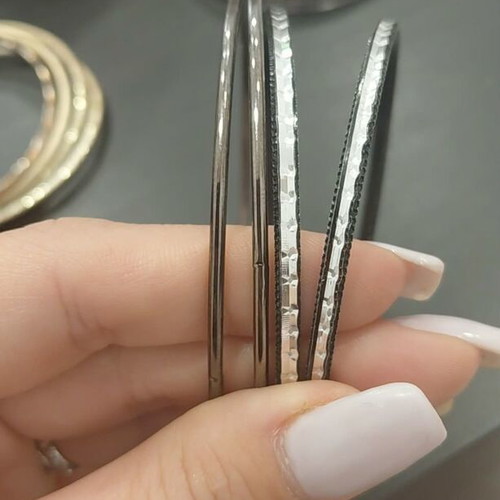 Bracelets set of 4 in black and silver color like new