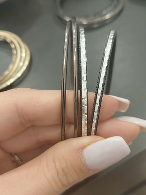 Bracelets set of 4 in black and silver color like new